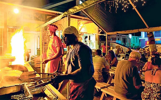 Oistins Fish Fry at night in Barbados